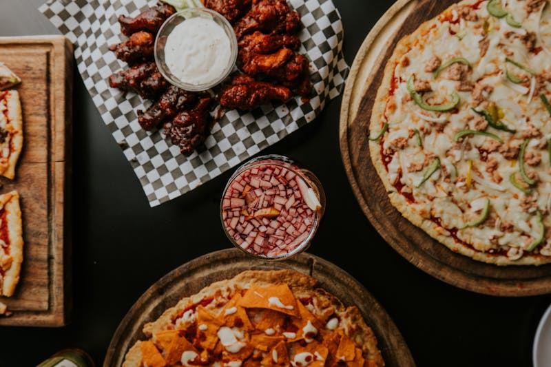 BBQ Chicken specialty pizza with caramelized onions