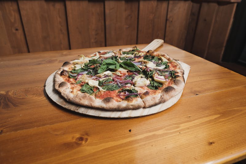 Spinach and ricotta white pizza with garlic