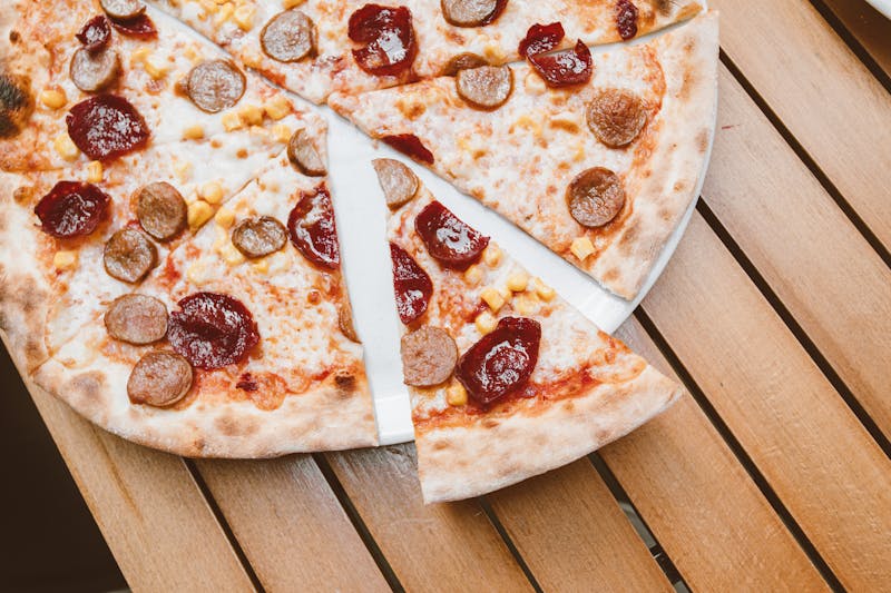 Classic Margherita jet's pizza with fresh basil and mozzarella