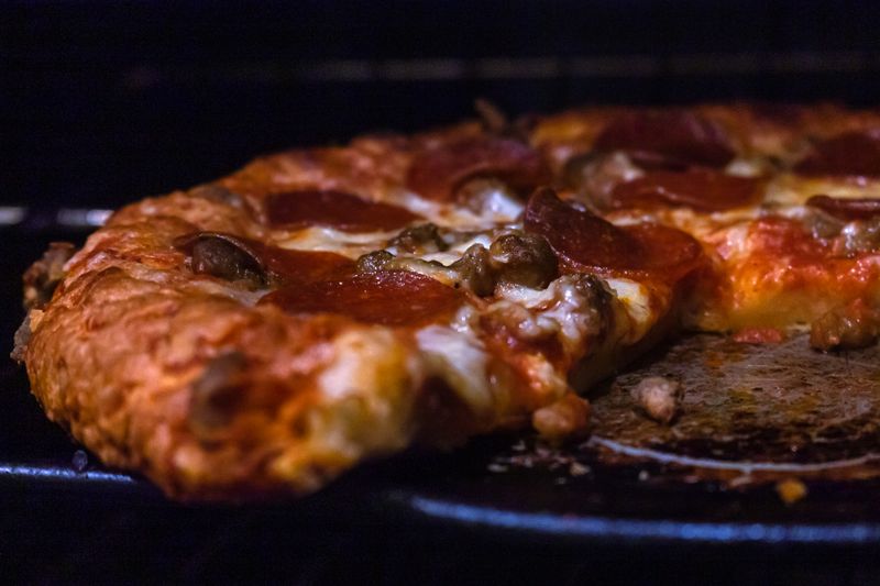 Chicago Deep Dish pizza with chunky tomato sauce